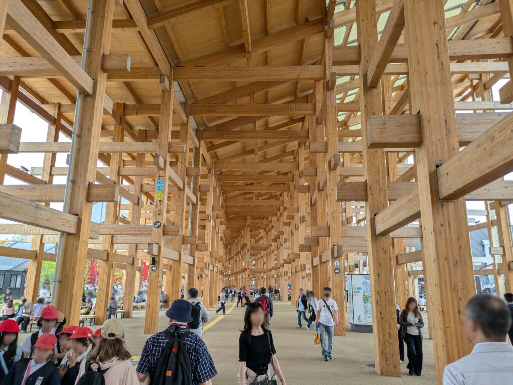 Under the large roof ring